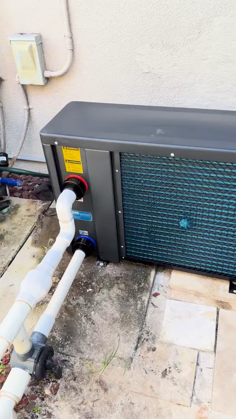 New heat pump on the same pad, plumbed in.
