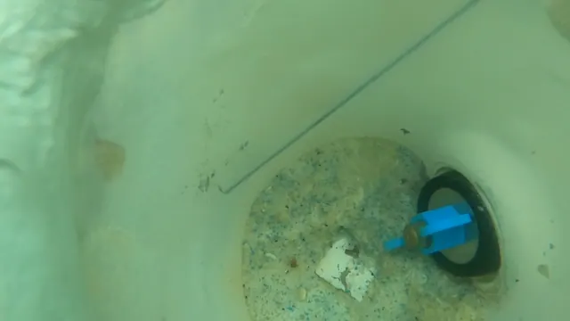 Dye released at the main drain fitting.