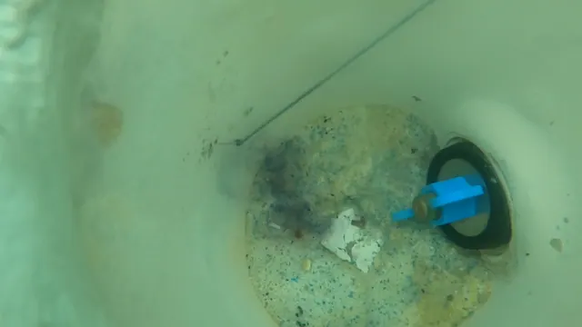 Dye pulled into the fitting: leak confirmed.