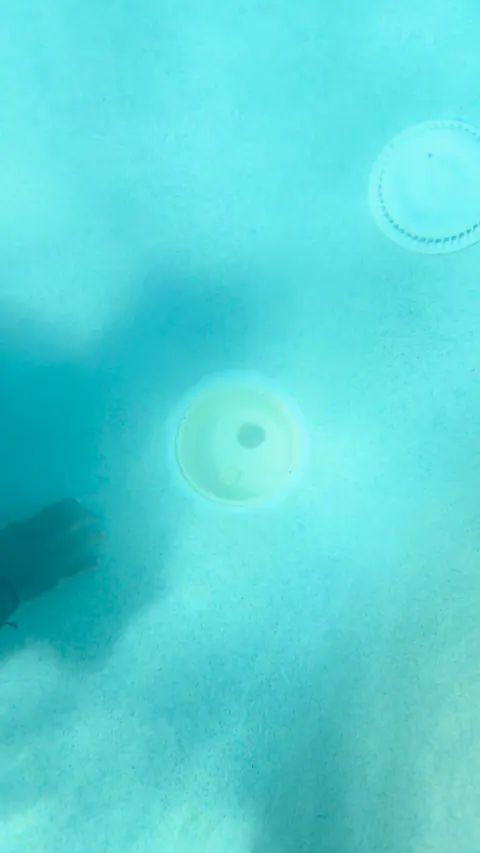 Pool refilled, main drain cover back in place.